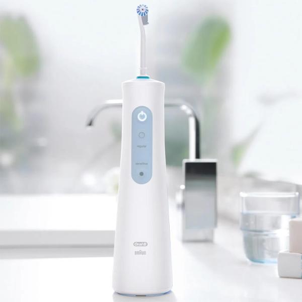 Oral-B Aquacare 4 ústní sprcha,  4 režimy,  2 intenzity,  šetrná k rovnátkům,  technologie Oxyjet,  bezdrátový provoz1