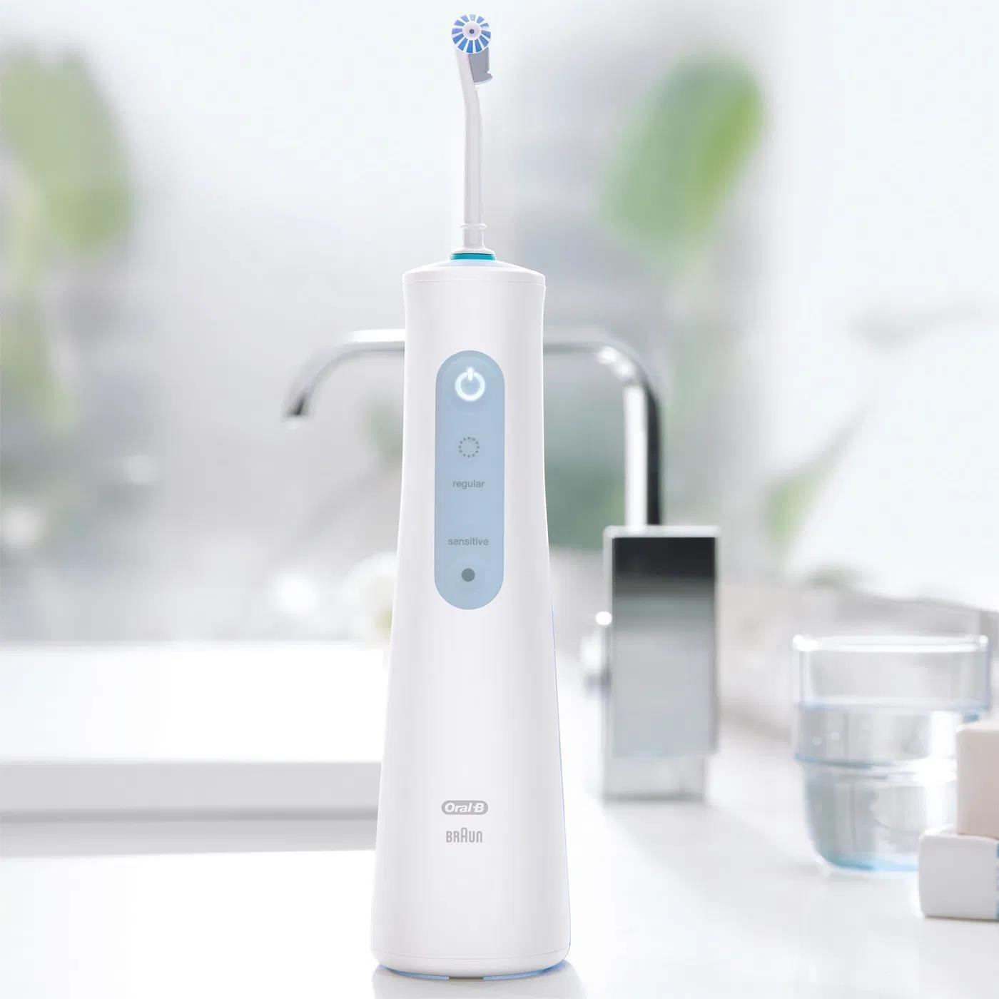 Oral-B Aquacare 4 ústní sprcha,  4 režimy,  2 intenzity,  šetrná k rovnátkům,  technologie Oxyjet,  bezdrátový provoz1 